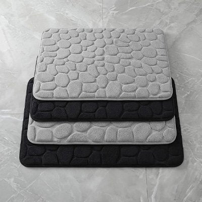 Tapis salle de bain gris et 2 noir en étant alternés superposés et décalés