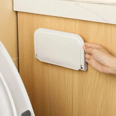 petite etagere mural salle de bain rabattue sur elle même
