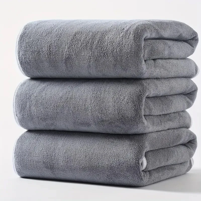 pile de 3 drap de bain homme couleur gris